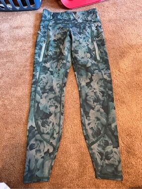Athleta Teal Floral High-Rise Leggings with Zip Pockets